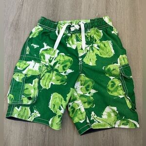 Boys Mossimo Swim shorts size small 6/7
Green and white